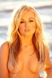 Kayden Kross Slips Off Her Shorts By The Sea