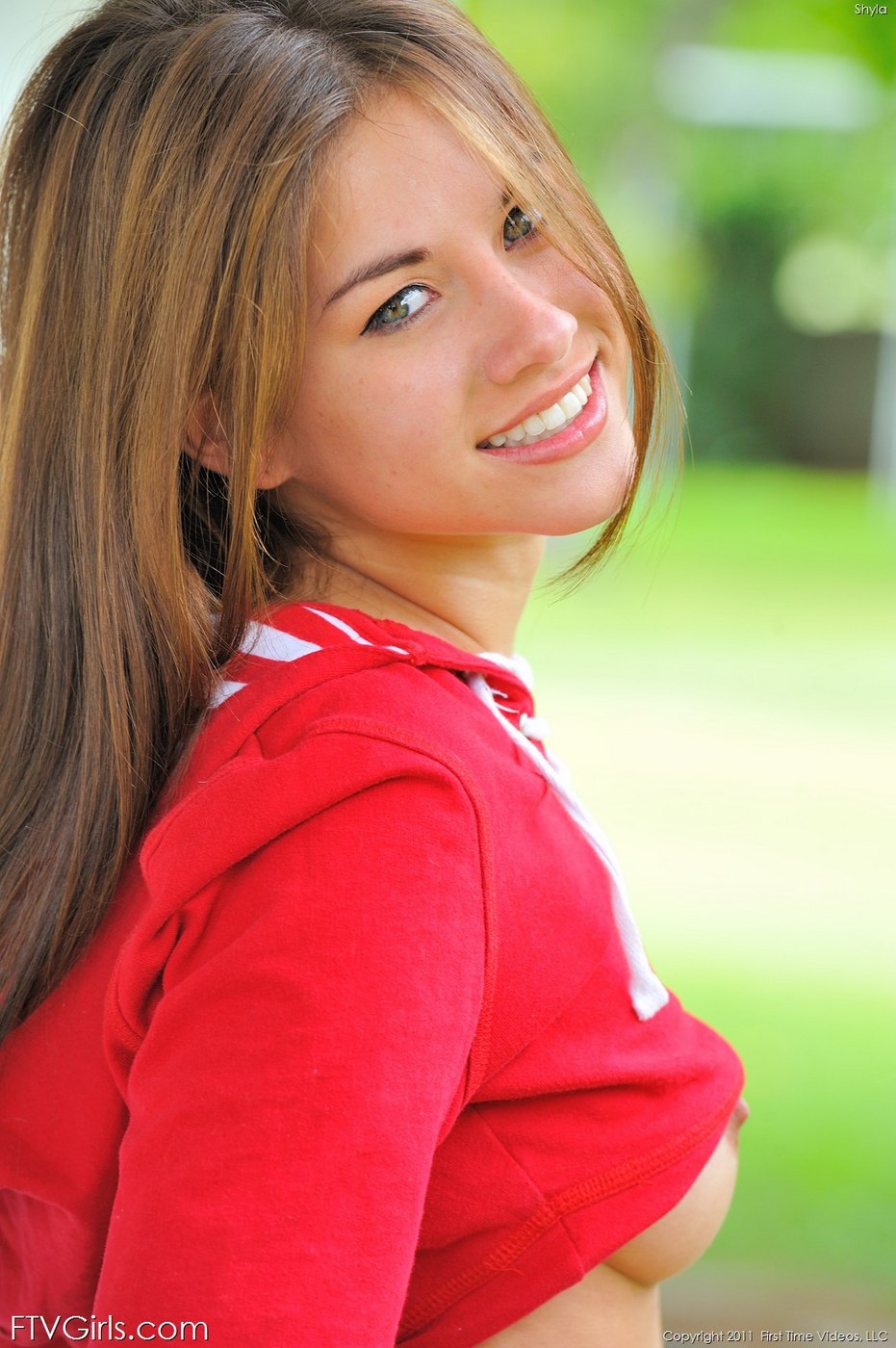Shyla using a dildo outside on the bench 02