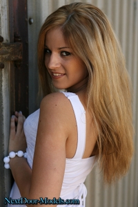 She wants to pose in her white bra and panties
