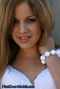 She wants to pose in her white bra and panties