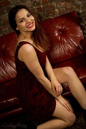 Lacey Banghard In Red Sofa