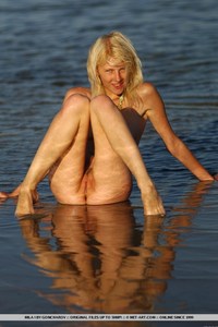Sexy teen Mila at the sea