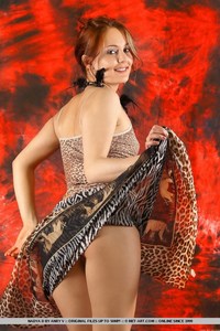 Nadya undressing by met-art