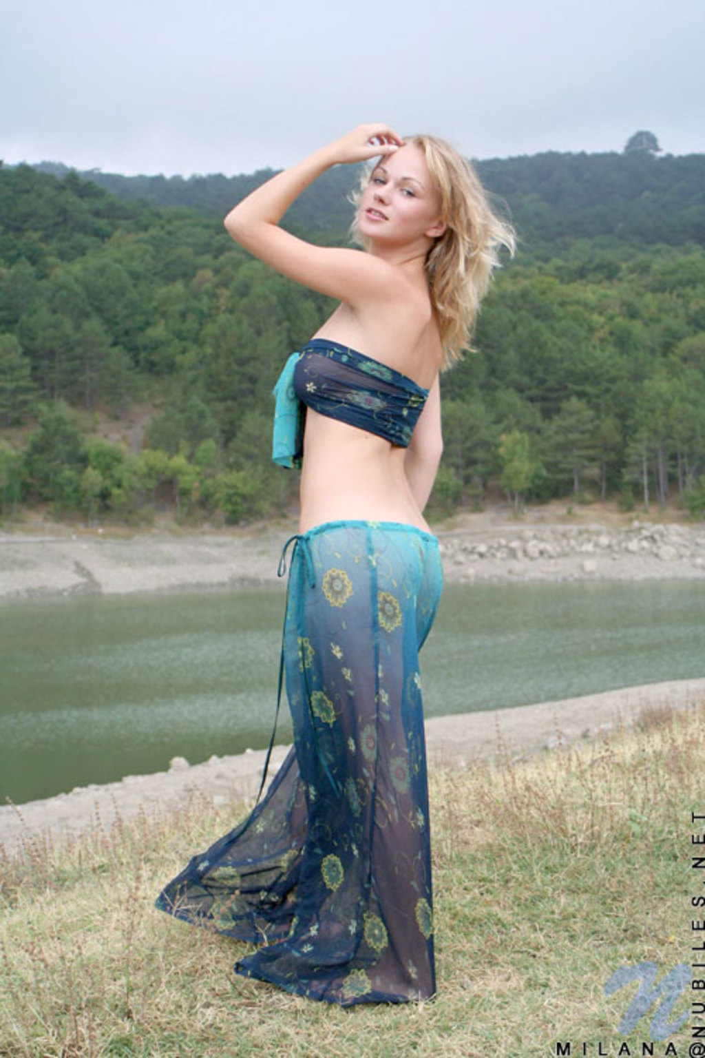 Busty blond teen posing outdoor 03