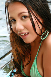Marina Jang Taking Off Her Green Bikini