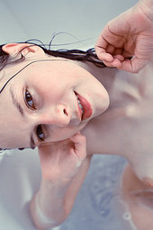 Sexy girl takes a hot bath