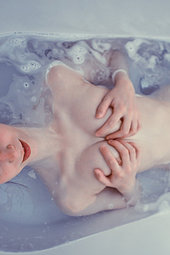 Sexy girl takes a hot bath