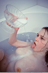 Sexy girl takes a hot bath