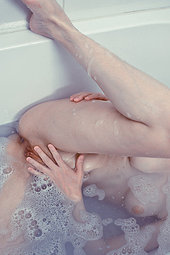 Sexy girl takes a hot bath