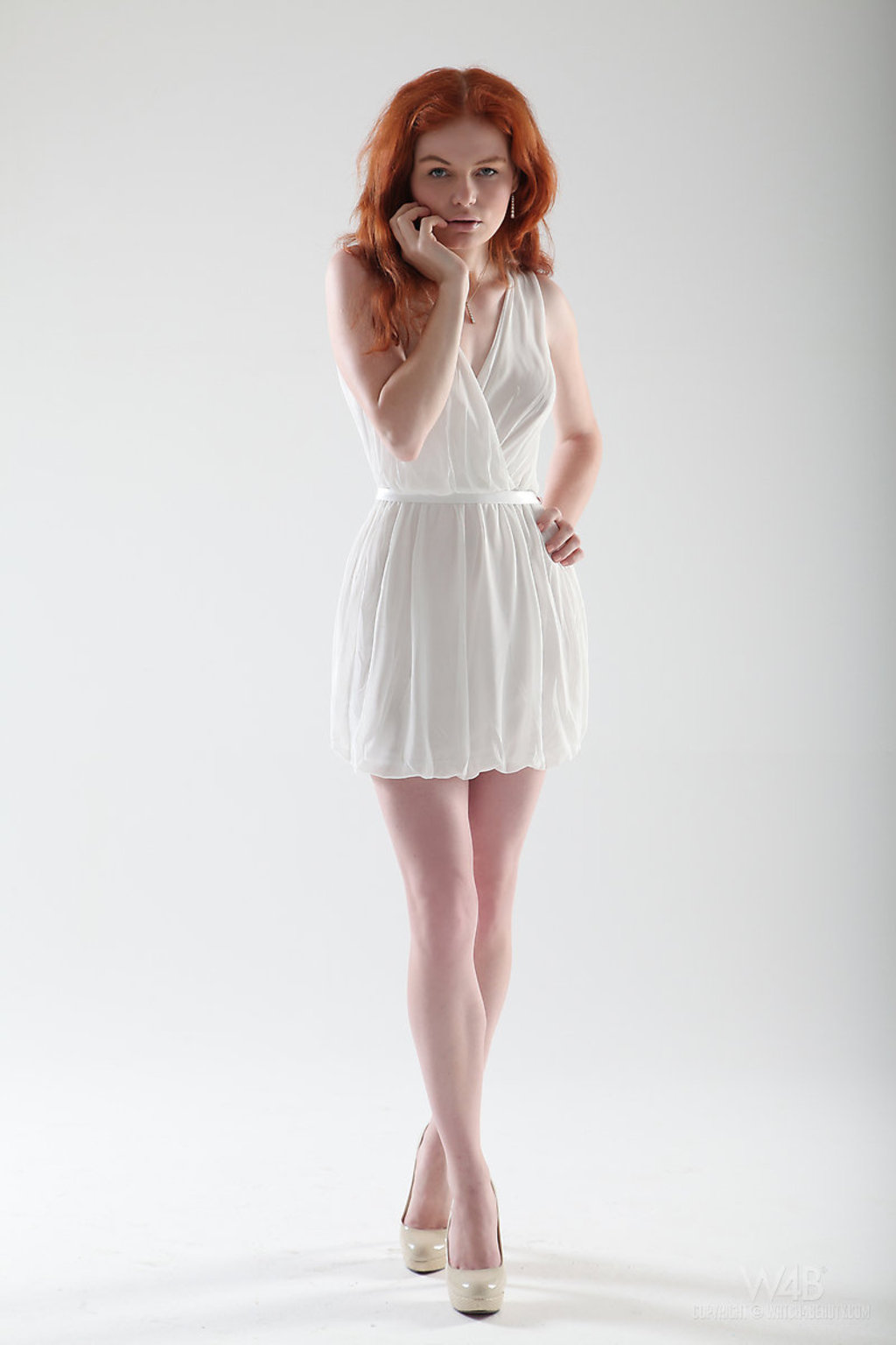 Redhead teen posing nude 00
